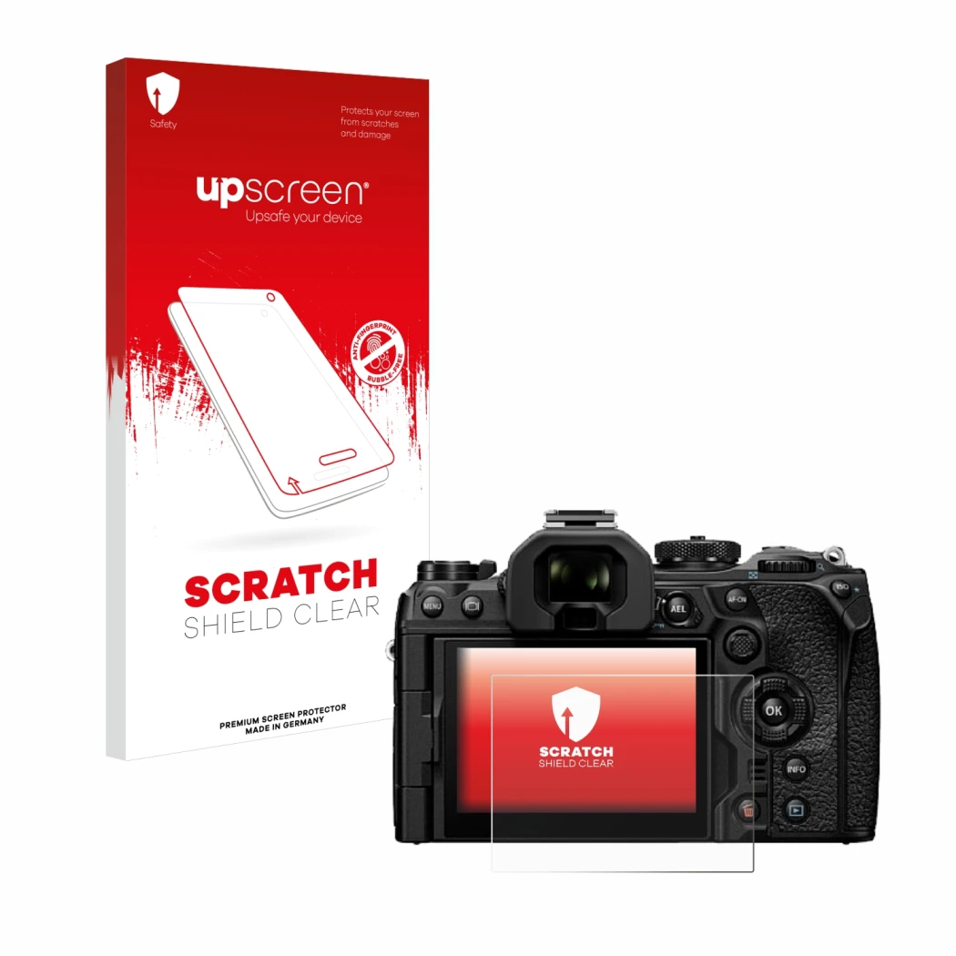 Face avant d’un emballage produit avec le logo de la marque upscreen. À côté, l’appareil Olympus OM System OM-1 Mark II est re