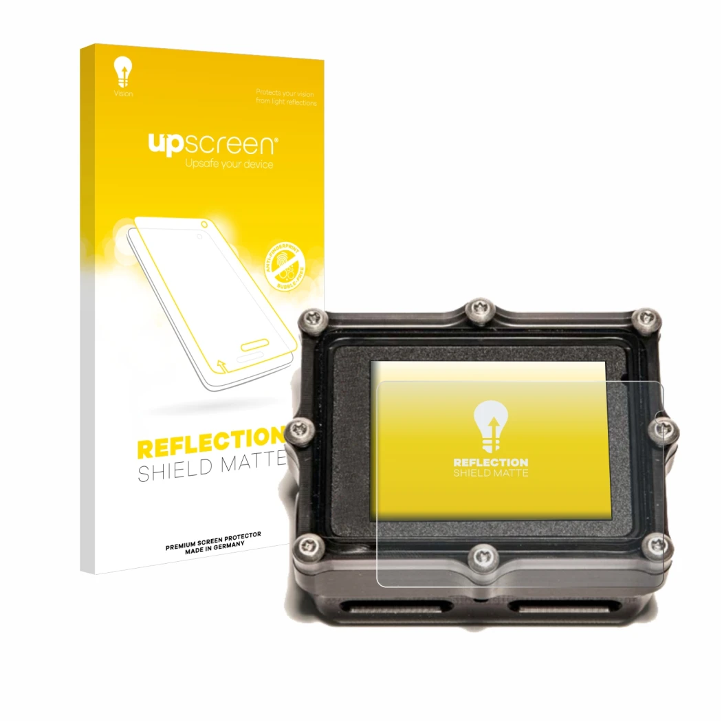 Face avant d’un emballage produit avec le logo de la marque upscreen. À côté, l’appareil Shearwater Petrel 2 dive computer est