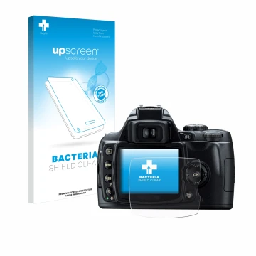 Face avant d’un emballage produit avec le logo de la marque upscreen. À côté, l’appareil Nikon D40 est représenté avec la prot