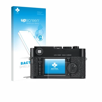 Face avant d’un emballage produit avec le logo de la marque upscreen. À côté, l’appareil Leica M9 est représenté avec la prote