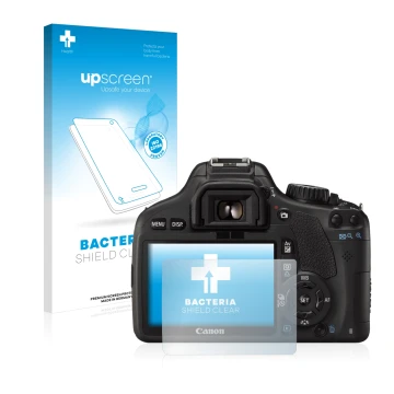 Face avant d’un emballage produit avec le logo de la marque upscreen. À côté, l’appareil Canon EOS 550D est représenté avec la