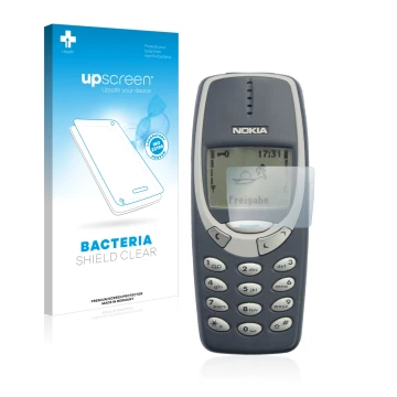 Face avant d’un emballage produit avec le logo de la marque upscreen. À côté, l’appareil Nokia 3310 2011 est représenté avec l