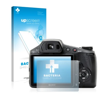 Face avant d’un emballage produit avec le logo de la marque upscreen. À côté, l’appareil Sony Cyber-Shot DSC-HX200V est représ