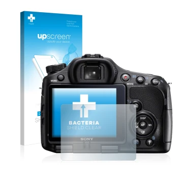 Face avant d’un emballage produit avec le logo de la marque upscreen. À côté, l’appareil Sony Alpha 57 (SLT-A57) est représent