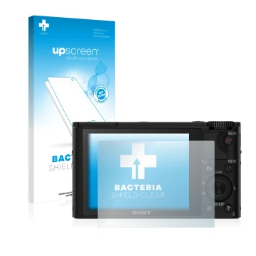 Face avant d’un emballage produit avec le logo de la marque upscreen. À côté, l’appareil Sony Cyber-Shot DSC-RX100 est représe