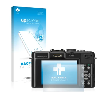 Face avant d’un emballage produit avec le logo de la marque upscreen. À côté, l’appareil Panasonic Lumix DMC-LX7 est représent