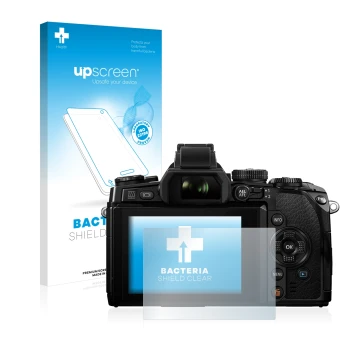 Face avant d’un emballage produit avec le logo de la marque upscreen. À côté, l’appareil Olympus OM-D E-M1 est représenté avec