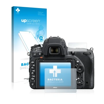 Face avant d’un emballage produit avec le logo de la marque upscreen. À côté, l’appareil Nikon D750 est représenté avec la pro