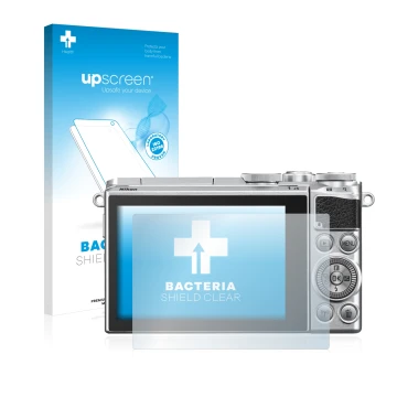 Face avant d’un emballage produit avec le logo de la marque upscreen. À côté, l’appareil Nikon 1 J5 est représenté avec la pro