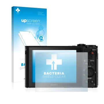 Face avant d’un emballage produit avec le logo de la marque upscreen. À côté, l’appareil Sony Cyber-Shot DSC-HX90V est représe
