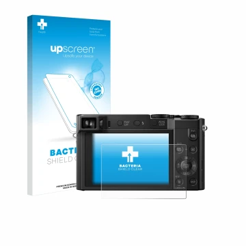 Face avant d’un emballage produit avec le logo de la marque upscreen. À côté, l’appareil Panasonic Lumix DMC-TZ101 est représe