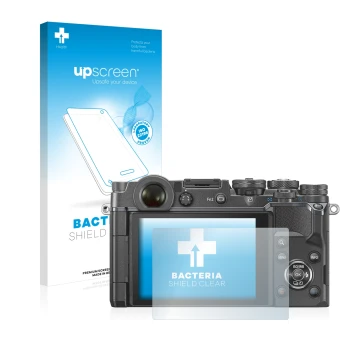 Face avant d’un emballage produit avec le logo de la marque upscreen. À côté, l’appareil Olympus PEN-F est représenté avec la 