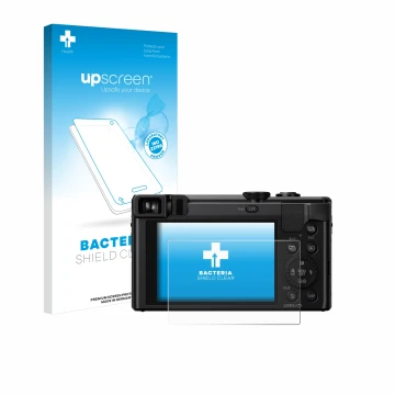 Face avant d’un emballage produit avec le logo de la marque upscreen. À côté, l’appareil Panasonic Lumix DMC-TZ80 est représen