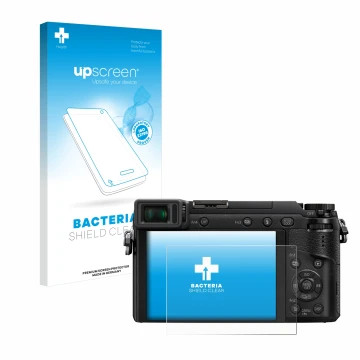 Face avant d’un emballage produit avec le logo de la marque upscreen. À côté, l’appareil Panasonic Lumix DMC-GX80 est représen