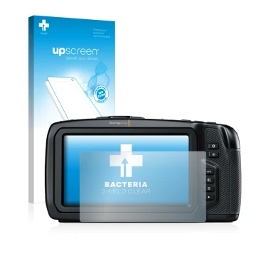 Face avant d’un emballage produit avec le logo de la marque upscreen. À côté, l’appareil Blackmagic Pocket Cinema Camera 4K es