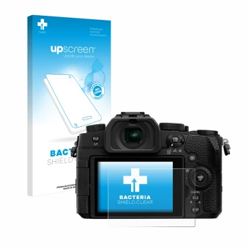 Face avant d’un emballage produit avec le logo de la marque upscreen. À côté, l’appareil Panasonic Lumix DC-G91 est représenté