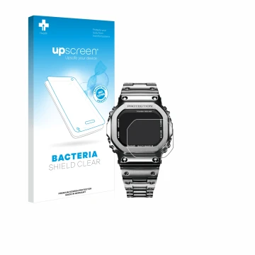 Face avant d’un emballage produit avec le logo de la marque upscreen. À côté, l’appareil Casio G-Shock GMW-B5000D-1ER est repr