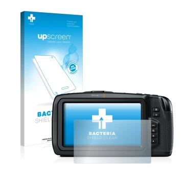 Face avant d’un emballage produit avec le logo de la marque upscreen. À côté, l’appareil Blackmagic Pocket Cinema Camera 6K es