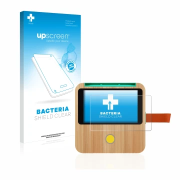 Face avant d’un emballage produit avec le logo de la marque upscreen. À côté, l’appareil tigerbox Touch est représenté avec la