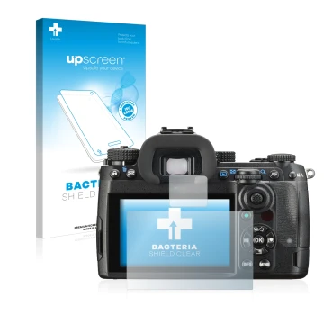 Face avant d’un emballage produit avec le logo de la marque upscreen. À côté, l’appareil Pentax K-3 Mark III est représenté av