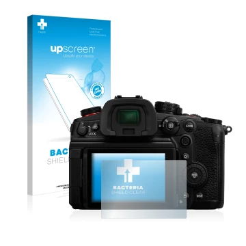 Face avant d’un emballage produit avec le logo de la marque upscreen. À côté, l’appareil Panasonic Lumix DC-GH6 est représenté