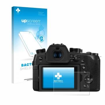Face avant d’un emballage produit avec le logo de la marque upscreen. À côté, l’appareil Panasonic Lumix DMC-FZ1000 II est rep