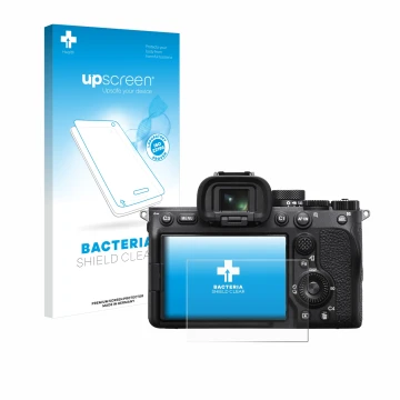 Face avant d’un emballage produit avec le logo de la marque upscreen. À côté, l’appareil Sony Alpha 7 IV est représenté avec l