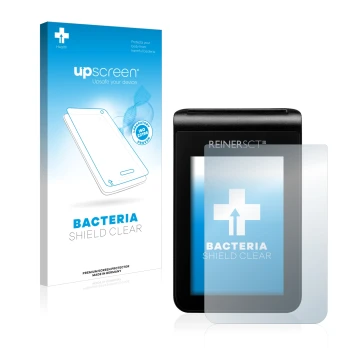 Face avant d’un emballage produit avec le logo de la marque upscreen. À côté, l’appareil REINER SCT tanJack deluxe est représe