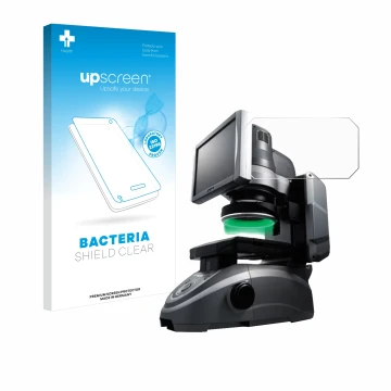 Face avant d’un emballage produit avec le logo de la marque upscreen. À côté, l’appareil Keyence IM-6125 Dessus en verre est r