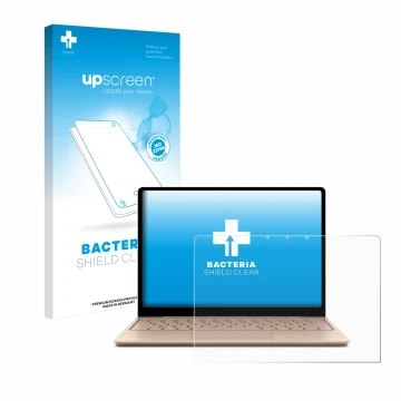 Face avant d’un emballage produit avec le logo de la marque upscreen. À côté, l’appareil Microsoft Surface Laptop Go 2 Busines