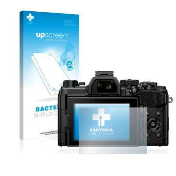Face avant d’un emballage produit avec le logo de la marque upscreen. À côté, l’appareil Olympus OM System OM-5 est représenté