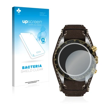 Face avant d’un emballage produit avec le logo de la marque upscreen. À côté, l’appareil Tudor Black Bay Chrono 41mm est repré