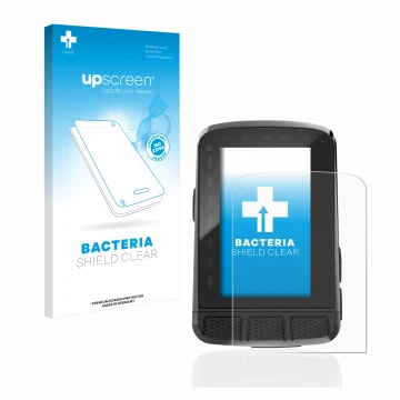 Face avant d’un emballage produit avec le logo de la marque upscreen. À côté, l’appareil Wahoo Elemnt Roam 2 est représenté av