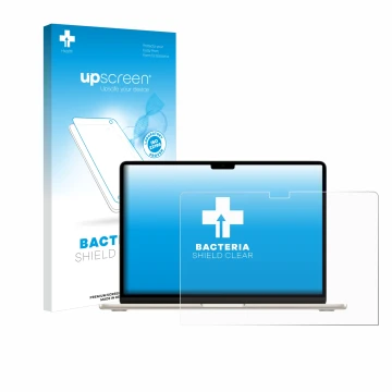 Face avant d’un emballage produit avec le logo de la marque upscreen. À côté, l’appareil Apple MacBook Air 15