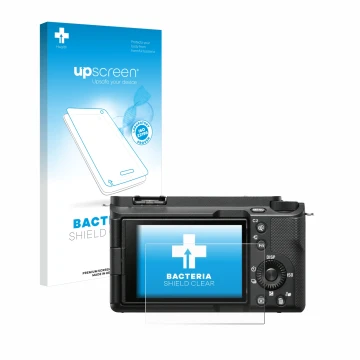 Face avant d’un emballage produit avec le logo de la marque upscreen. À côté, l’appareil Sony Alpha ZV-E1 est représenté avec 