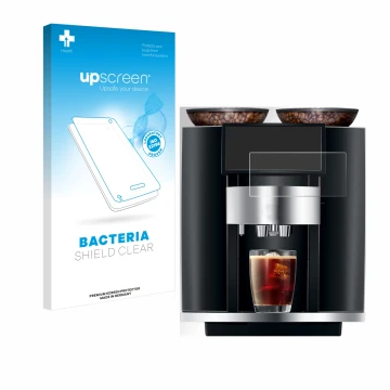 Face avant d’un emballage produit avec le logo de la marque upscreen. À côté, l’appareil Jura Giga 10 est représenté avec la p