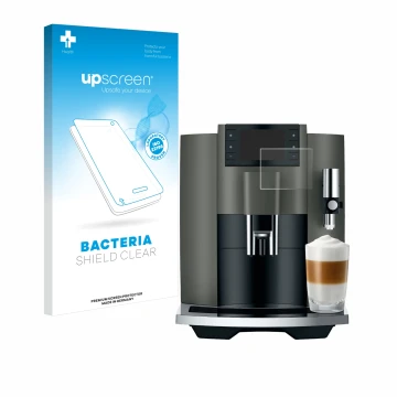 Face avant d’un emballage produit avec le logo de la marque upscreen. À côté, l’appareil Jura E8 (EC) est représenté avec la p