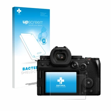 Face avant d’un emballage produit avec le logo de la marque upscreen. À côté, l’appareil Panasonic Lumix DC-S5M2X est représen