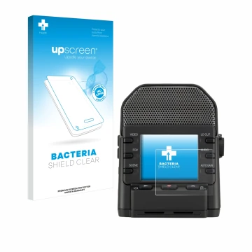 Face avant d’un emballage produit avec le logo de la marque upscreen. À côté, l’appareil Zoom Q2n-4K est représenté avec la pr