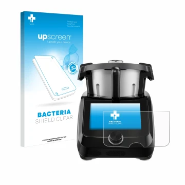 Face avant d’un emballage produit avec le logo de la marque upscreen. À côté, l’appareil SilverCrest Monsieur Cuisine Smart BL