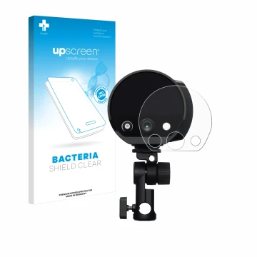 Face avant d’un emballage produit avec le logo de la marque upscreen. À côté, l’appareil Profoto B10X est représenté avec la p