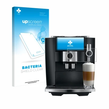 Face avant d’un emballage produit avec le logo de la marque upscreen. À côté, l’appareil Jura J8 twin est représenté avec la p