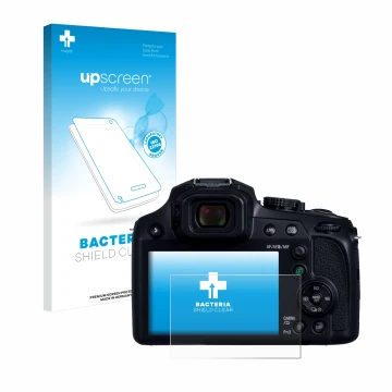 Face avant d’un emballage produit avec le logo de la marque upscreen. À côté, l’appareil Panasonic Lumix DC-FZ82D est représen