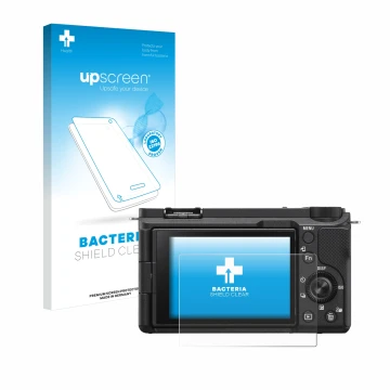 Face avant d’un emballage produit avec le logo de la marque upscreen. À côté, l’appareil Sony Alpha ZV-E10 II est représenté a