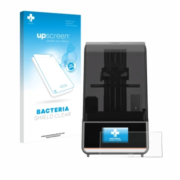 Face avant d’un emballage produit avec le logo de la marque upscreen. À côté, l’appareil Anycubic Photon Mono M7 Pro est repré