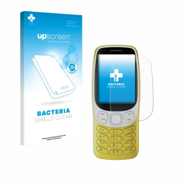 Face avant d’un emballage produit avec le logo de la marque upscreen. À côté, l’appareil Nokia 3210 est représenté avec la pro
