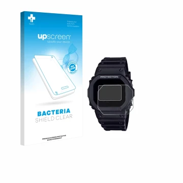 Face avant d’un emballage produit avec le logo de la marque upscreen. À côté, l’appareil Casio G-Shock DW-5600RL-1 est représe