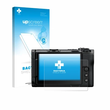 Face avant d’un emballage produit avec le logo de la marque upscreen. À côté, l’appareil Nikon ZR 2025 est représenté avec la 