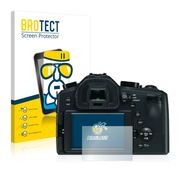 Face avant d’un emballage produit avec le logo de la marque BROTECT. À côté, l’appareil Leica V-LUX (Typ 114) est représenté a