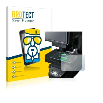 Face avant d’un emballage produit avec le logo de la marque BROTECT. À côté, l’appareil Keyence IM-7030 Dessus en verre est re